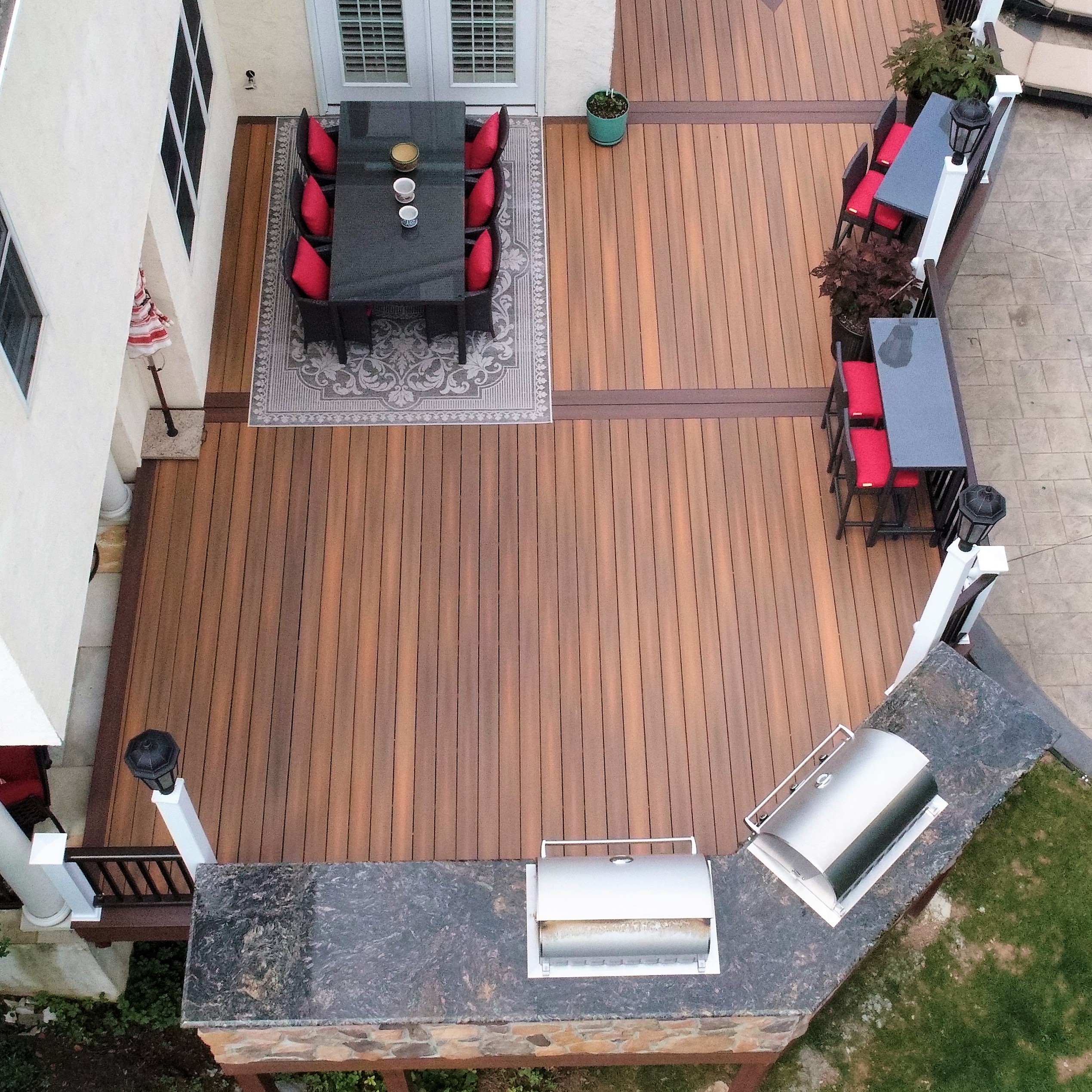 Outdoor kitchen by Paul Construction and Awning